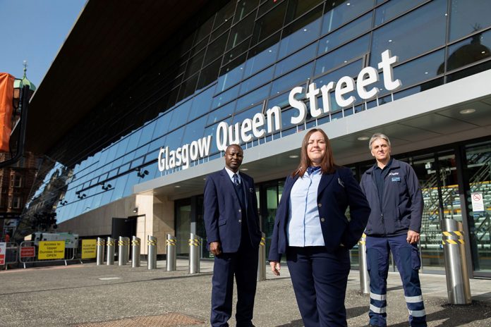 ScotRail employees outside Queen Street station