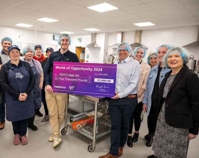 Heathrow presenting Ochil Fudge with grant